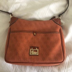 Rust colored Dooney and Burke purse